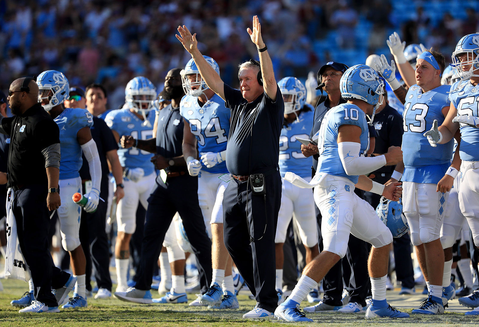 Mack Brown and Les Miles welcomed back in style